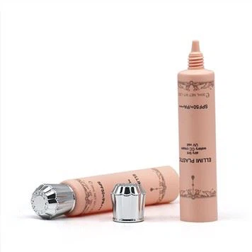 Kozmetička cijev s cvjetnom kapom